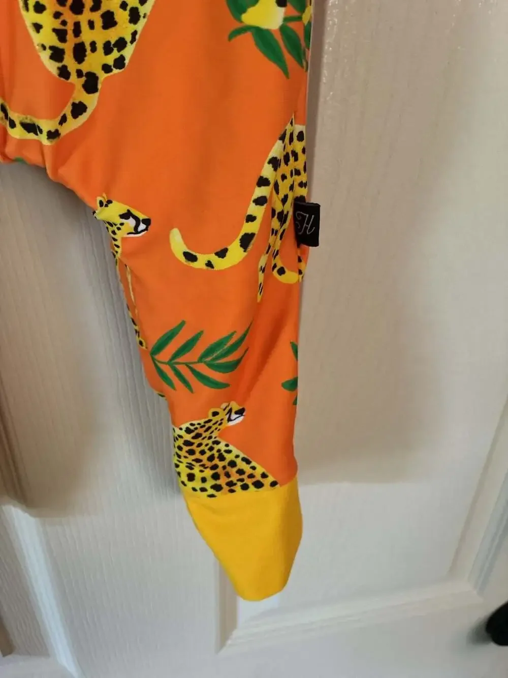 Honeysuckle Swim Company Orange Leopard Print Long Sleeve Swim Romper